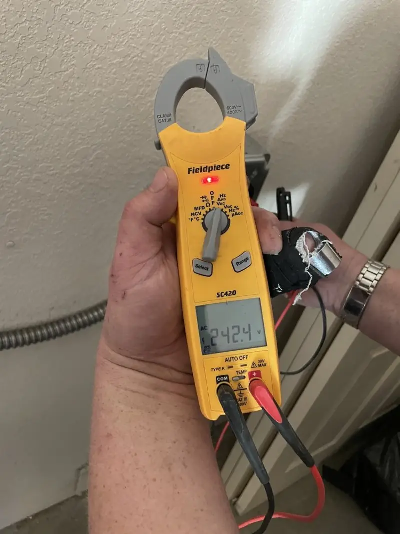 Voltage testing with clamp meter during Aluminum Wiring Replacement in Colchester